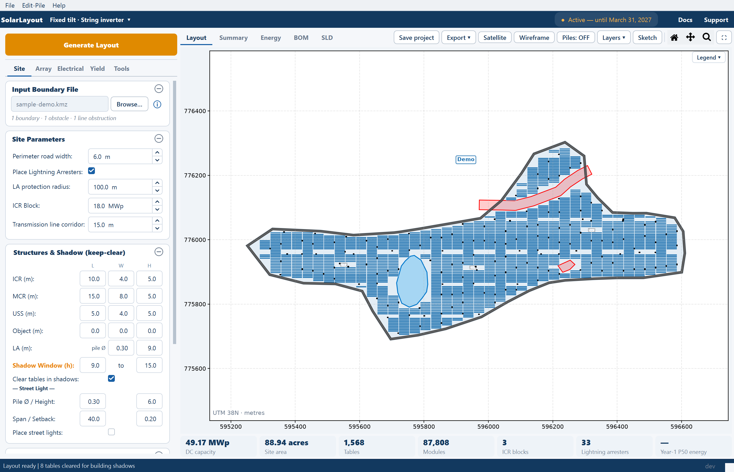 The main window after a fixed-tilt run on the sample site: the placed tables, control rooms and inverters on the plot, the Tools tab unlocked, and the plant chips filled in.
